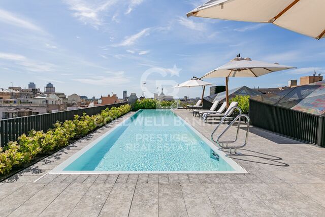 Loft design à louer avec terrasse privée dans l'immeuble moderniste Casa Burés